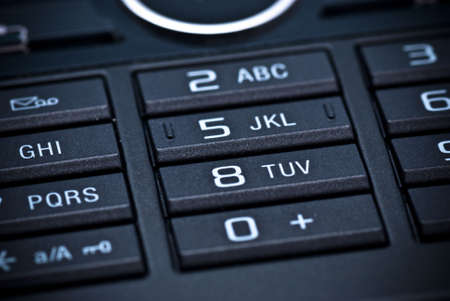 A closeup of the keypad of a mobile phoneの写真素材