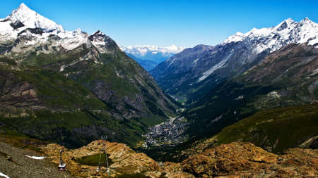 The Swiss resort Zermatt on a sunny summer day with clear blue skyの写真素材