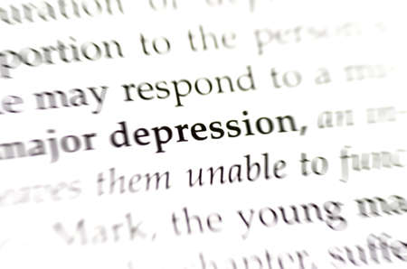 The word depression with surrounded by blurred and faded wordsの写真素材
