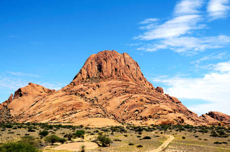 The african mountain Spitzkoppe in Namibia with blue sky above