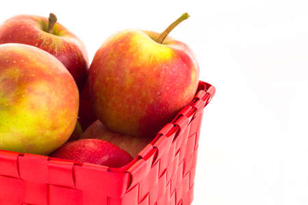 Fresh apples in a basketの写真素材