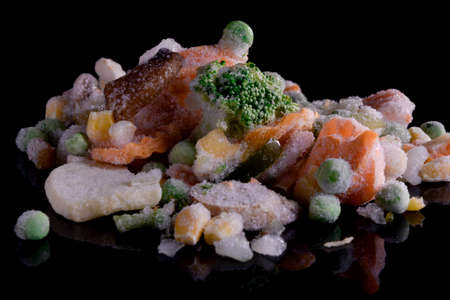 set of frozen vegetables on a black backgroundの写真素材