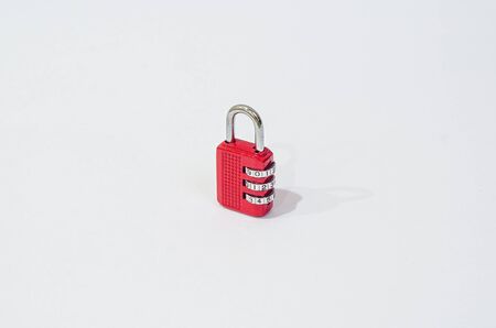A small red colored numbered lockの写真素材