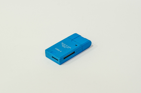Blue colored memory card readerの写真素材