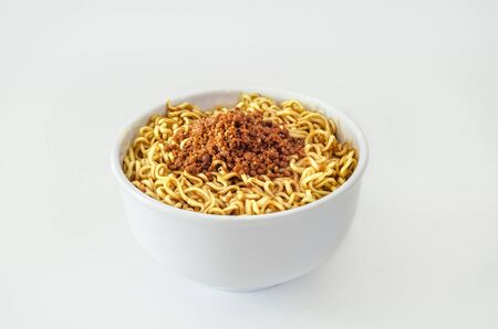 Fried instant noodles in a white bowlの写真素材