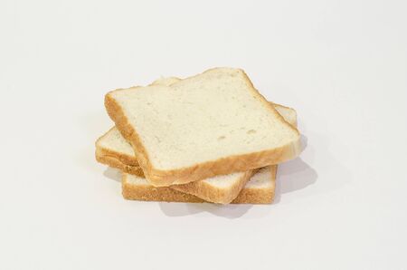 Three white bread on top of each otherの写真素材