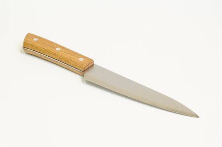 A knife with wodden handle on white backgroundの写真素材