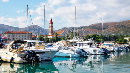Vew of Trogir town from a harbor with boats and Trogir Cathedral bell towerのeditorial素材