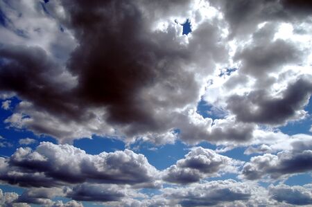 Clouds are levitating on the blue sky.
