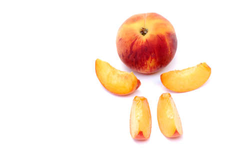 It is a human person of one whole peach and four slices on white background.の写真素材