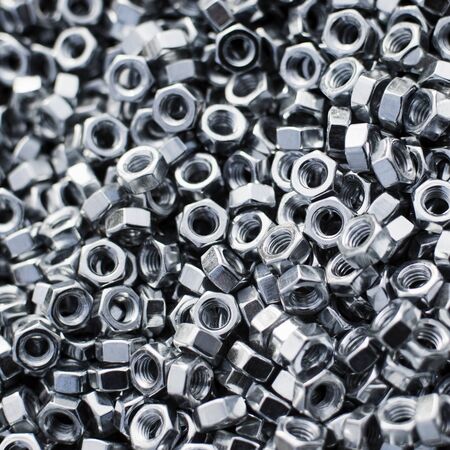 Silver screw nuts are as texture background.