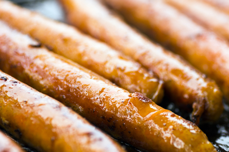 Macro photo about the grilled sausages or frankfurters.の写真素材