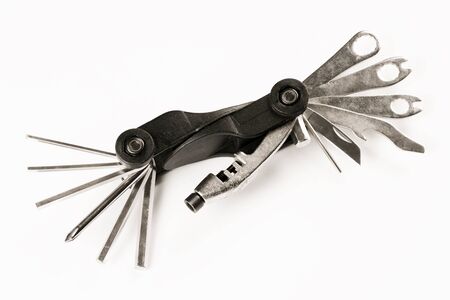 Multi functional tool is isolated on white background.の写真素材