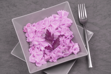 The pasta is in pink sauce, Italian food, modern gastronomy.の写真素材