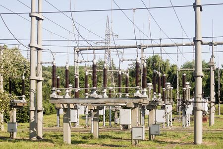 Old small electrical substation in the nature, powerline networking.