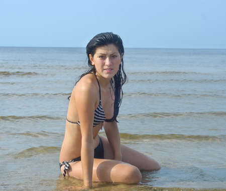 Young woman on the beachの写真素材