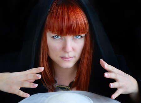 Beautiful sad woman in a hood 