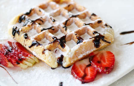 Belgian waffle and strawberriesの写真素材