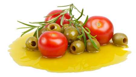 Olives and tomatoes isolated on white の写真素材