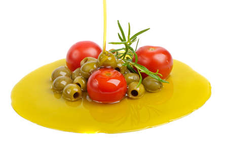 Olives and tomatoes isolated on white の写真素材