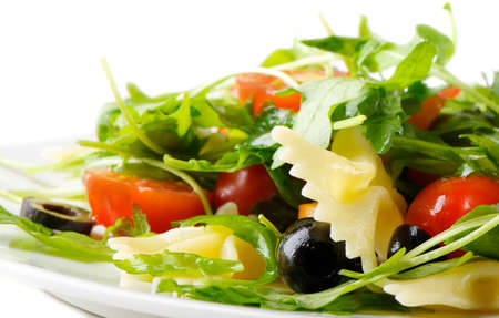 Pasta salad isolated on whiteの写真素材