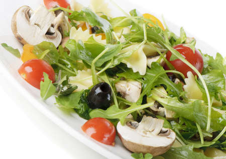 Pasta salad isolated on whiteの写真素材