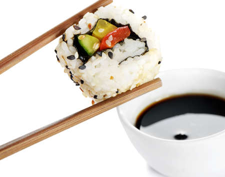sushi on chopstickの写真素材