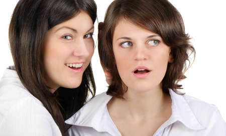 Two young happy women talkの写真素材