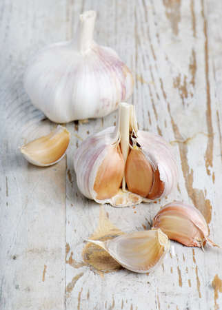 Garlic on a wooden tableの写真素材