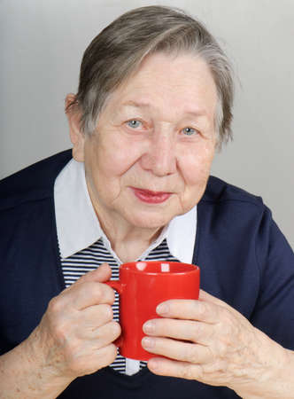 Woman with tea cupの写真素材