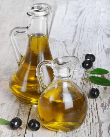 Olive oil and black olivesの写真素材