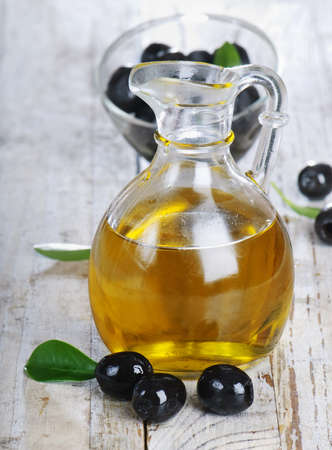 Olive oil and olivesの写真素材