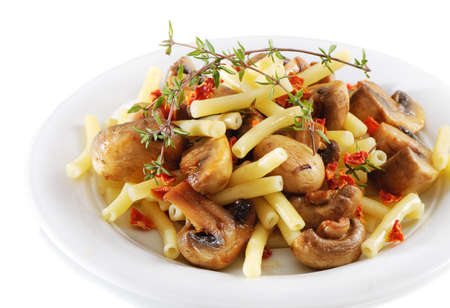 Pasta with mushrooms isolated on whiteの写真素材