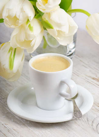 Coffee and spring flowersの写真素材