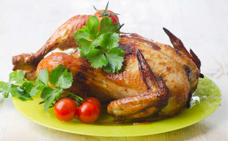 Chicken and tomatoesの写真素材
