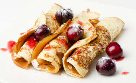 pancakes with cherriesの写真素材