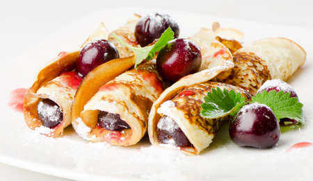 pancakes with cherriesの写真素材