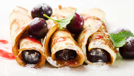 pancakes with cherriesの写真素材