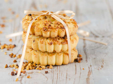 stack of cookies on a wooden tableの写真素材
