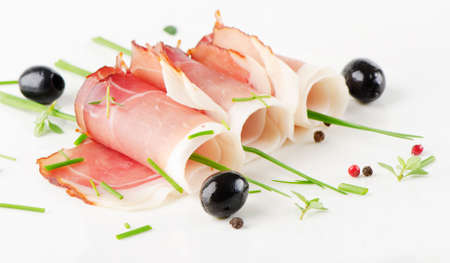 Slices of bacon and herbsの写真素材