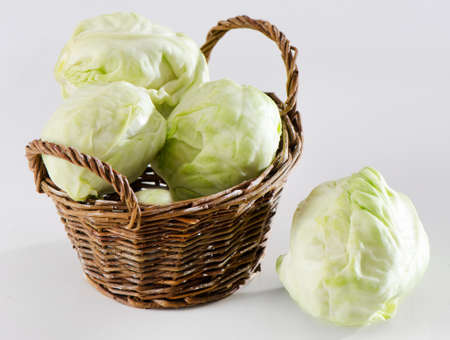 fresh cabbage in basketの写真素材