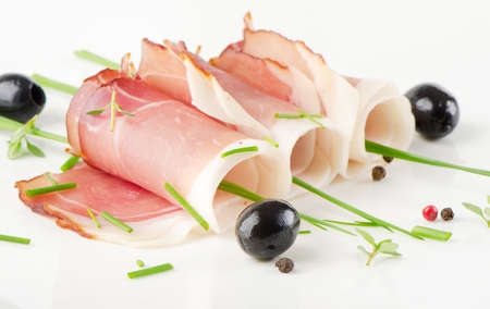 Slices of bacon and herbsの写真素材