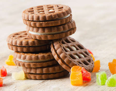 stack of cookies on a wooden tableの写真素材
