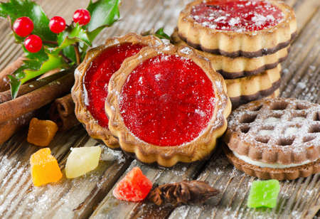 Cookies and spices on a wooden tableの写真素材