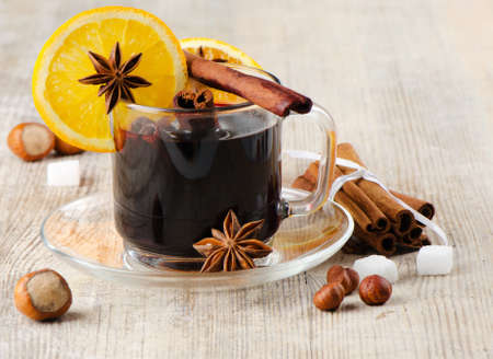 mulled wine  on a wooden tableの写真素材