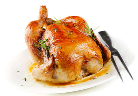 Roasted chicken isolated on whiteの写真素材