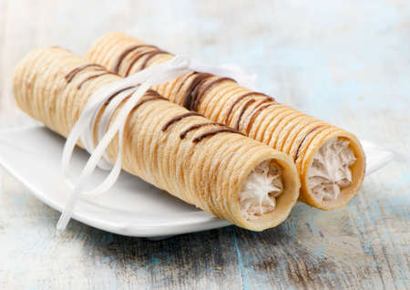 Two cookies on  wooden tableの写真素材