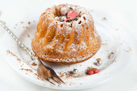 Sweet muffin on white plateの写真素材