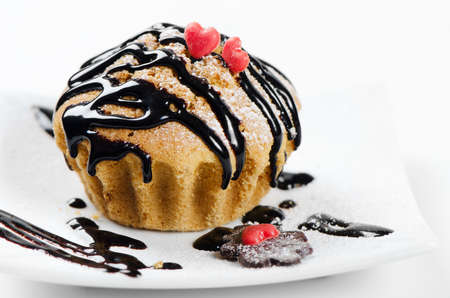 Sweet holiday's muffin on white plateの写真素材