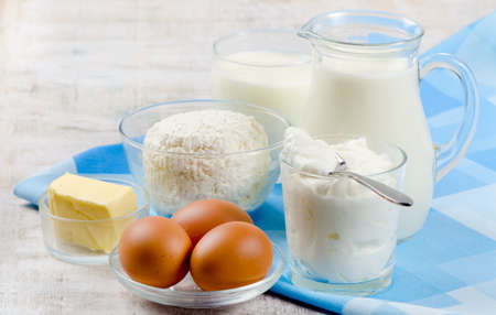 Dairy products on  wooden tableの写真素材